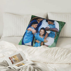 Custom family photo pillow cover in a bedroom setting