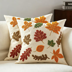 Set of two embroidered polyester canvas pillow covers with raised autumn leaves in rust, orange and green