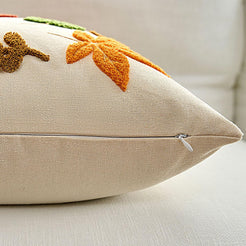 Close-up of hidden zipper and canvas edge on embroidered polyester canvas pillow cover with autumn leaf embroidery