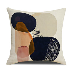 Linen-look polyester pillow cover with navy, beige and rust geometric circles, shown on white