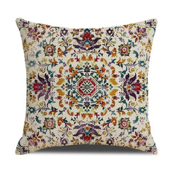 Linen-look polyester pillow cover with multicolor floral carpet medallion, shown on white