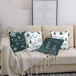 short-pile plush polyester pillow covers with green and white winter quote prints, styled on a cream sofa