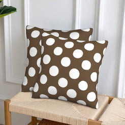 Taupe brown polka dot velvet pillow covers styled on a woven chair