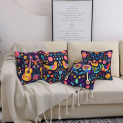short-pile plush polyester pillow covers with colorful bird, guitar and floral folk-art prints, styled on a cream sofa