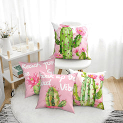 Summer short-pile plush pillow covers with pink cactus illustrations and summer quotes, styled in a bright room