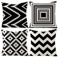 Set of four water-resistant linen-look polyester pillow covers with bold chevrons, concentric squares and diamonds