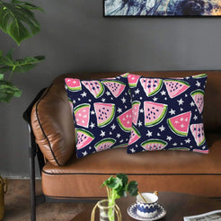 Velvet pillow covers with navy watermelon slices, styled on a sofa