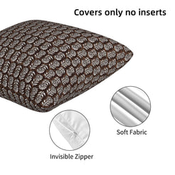 Close-up of hidden zipper and soft velvet texture on velvet pillow cover with small brown block-print-inspired motifs