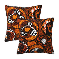 Set of two velvet pillow covers with orange and brown circular dot motifs
