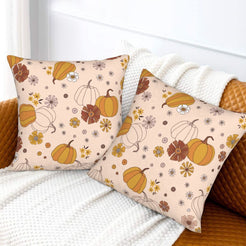Halloween velvet pillow covers with blush pumpkins and flowers, styled on a sofa