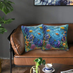 Velvet coastal pillow covers with tropical fish and coral reef, styled in a living room