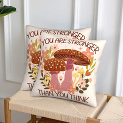 Velvet pillow covers with stronger than you think mushroom quote, styled on a woven chair