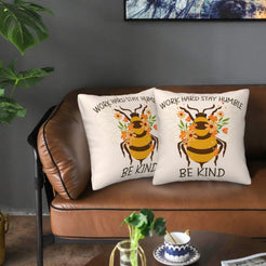 Velvet pillow covers with be kind bee quote, styled in a living room