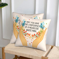 Velvet pillow covers with confidence and mediocrity floral quote, styled in a living room