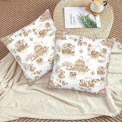 Mardi Gras velvet pillow covers with New Orleans toile in tan on white, styled on a floor cushion
