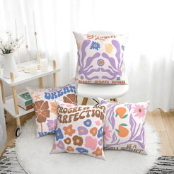 Short-pile plush pillow covers with pastel retro flowers and motivational quotes, styled in a bright living room
