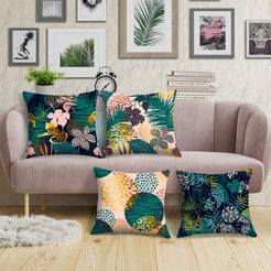 Short-pile plush pillow covers with dark tropical leaves and leopard spots, styled around a pale pink sofa