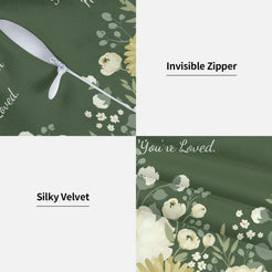 Hidden zipper and soft velvet detail on a pillow cover with dark green floral pattern and heartfelt love quote