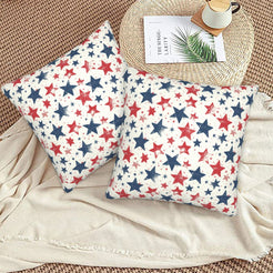 4th of July velvet pillow covers with distressed red and blue stars, styled on a woven chair