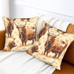 Western velvet pillow covers with cream Highland cows, styled on a sofa