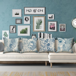 water-resistant linen-look polyester pillow covers with blue seashell and octopus prints, styled on a white sectional
