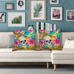 Water-resistant pillow covers with multicolor skulls and tropical flowers, styled on a white sofa