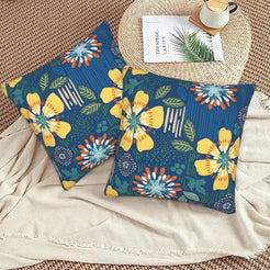 Bohemian floral velvet pillow covers with navy yellow and blue flowers, styled on a woven chair