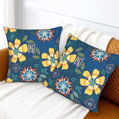 Bohemian floral velvet pillow covers with navy yellow and blue flowers, styled on a sofa