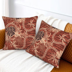 Bohemian floral velvet pillow covers with rust tropical leaves, styled on a sofa