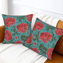 Bohemian floral velvet pillow covers with teal red poppies, styled on a sofa