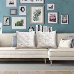 quilted polyester pillow covers with raised white bunny silhouettes and pink ears, styled on a white sectional