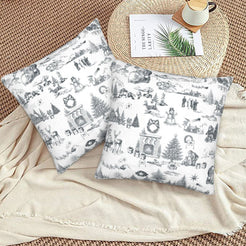 Gray on white classic Christmas town toile velvet pillow covers styled on a floor cushion