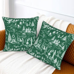 White on green winter holiday toile velvet pillow covers styled on a bed