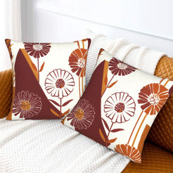Fall velvet pillow covers with cream burgundy blocks and line-art flowers, styled on a white sofa