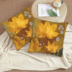 Velvet pillow covers with scattered autumn maple leaves, styled on a beige sofa