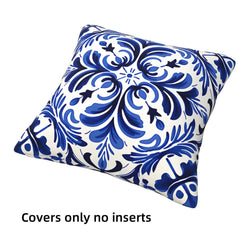 Short-pile plush pillow cover with a blue and white floral tile medallion, shown without an insert