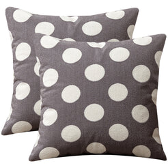 Set of two loop-pile textured polyester pillow covers with raised white polka dots on gray
