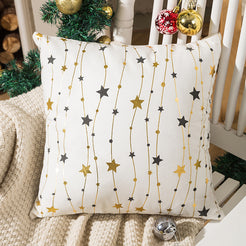 short-pile plush polyester pillow cover with hanging gold stars on white, shown beside a Christmas tree