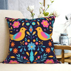 short-pile plush polyester pillow cover with paired colorful birds among flowers on navy, shown on a cream sofa