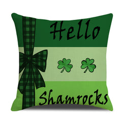 Short-pile plush pillow cover with Hello Shamrocks text and a gingham bow, shown on pale green