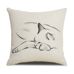 Linen-look polyester pillow cover with sleeping cat in minimal black line art, shown on white