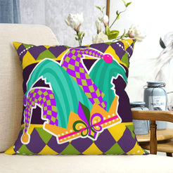 short-pile plush polyester pillow cover with colorful jester hat and party streamers, shown on a cream sofa