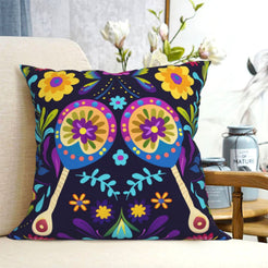 short-pile plush polyester pillow cover with colorful floral owl motif on navy, shown on a cream sofa