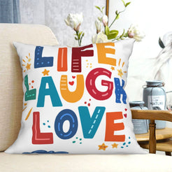 short-pile plush polyester pillow cover with Life Laugh Love lettering, shown on a cream sofa