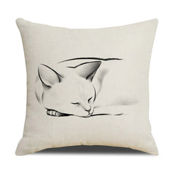 Linen-look polyester pillow cover with curled sleeping cat in minimal black line art, shown on white