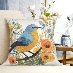 short-pile plush polyester pillow cover with blue and yellow bird among orange flowers, shown on a cream sofa