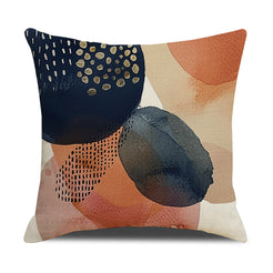 Linen-look polyester pillow cover with navy, blush and gray abstract circles, shown on white