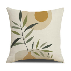 Linen-look polyester pillow cover with mustard sun and layered green branches, shown on white
