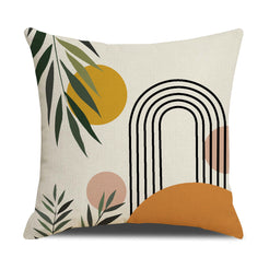 Linen-look polyester pillow cover with black arch, mustard sun and botanical leaves, shown on white