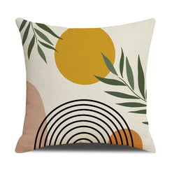 Linen-look polyester pillow cover with mustard sun, black rainbow and green branches, shown on white